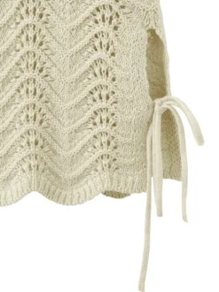 Pull en coton beige uni pourvu d'une coupe évasée et de manches longues