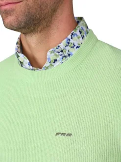 Pull en coton biologique vert uni avec une coupe droite et un col rond