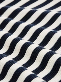 Pull en coton blanc et marine pourvu d'un col rond et de manches longues
