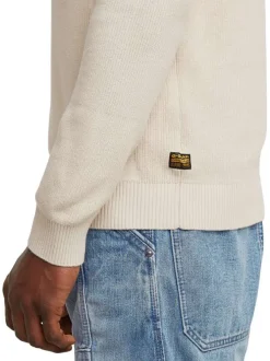 Pull en coton blanc uni avec une coupe droite et un col rond
