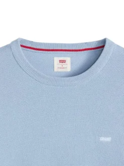 Pull en coton bleu ciel uni avec une coupe droite et un col rond