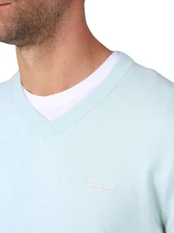 Pull en coton bleu ciel uni avec une coupe droite et un col V