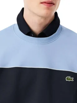 Pull en coton bleu à coupe droite pourvu d'un col rond en maille piquée