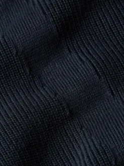 Pull en coton bleu marine en maille côtelée avec un col camionneur