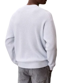 Pull en coton ciel uni avec une coupe droite et un col rond