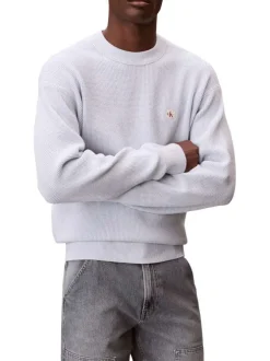 Pull en coton ciel uni avec une coupe droite et un col rond