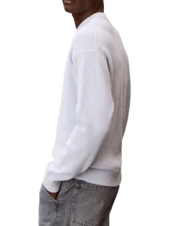 Pull en coton ciel uni avec une coupe droite et un col rond