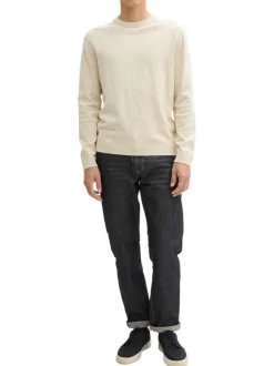 Pull en coton écru chiné avec un col rond et le logo de la marque brodé