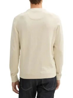 Pull en coton écru chiné avec un col rond et le logo de la marque brodé