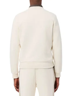 Pull en coton écru à coupe droite pourvu d'un col rond en maille piquée