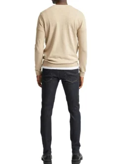 Pull en coton maille piquée beige avec une coupe droite et col rond