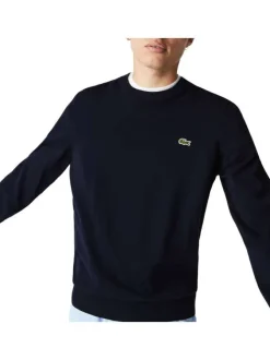 Pull en coton marine avec petit logo brodé à la poitrine col rond