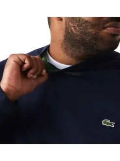Pull en coton marine avec petit logo brodé à la poitrine col rond