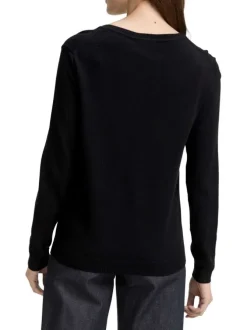 Pull en coton marine uni avec un col rond et des manches longues