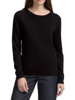Pull en coton marine uni avec un col rond et des manches longues
