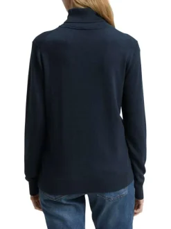 Pull en coton marine uni avec un col roulé et des manches longues