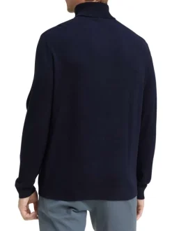 Pull en coton marine uni avec un col roulé et des manches longues