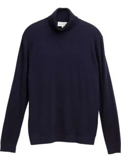 Pull en coton marine uni avec un col roulé et des manches longues