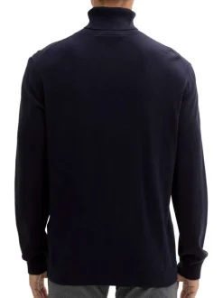 Pull en coton marine uni avec une coupe droite et col roulé en côtes