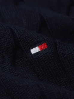 Pull en coton marine uni avec une coupe droite et un col camionneur boutonné