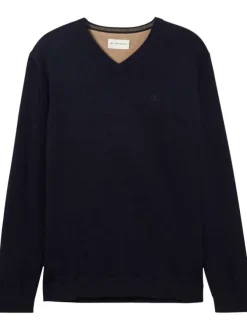 Pull en coton marine uni avec une coupe droite et un col en V