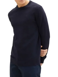 Pull en coton marine uni avec une coupe droite et un col rond