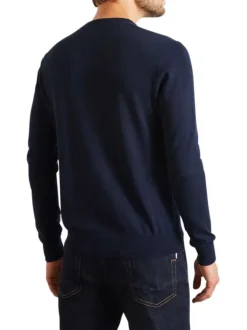 Pull en coton marine uni avec une coupe droite et un col rond