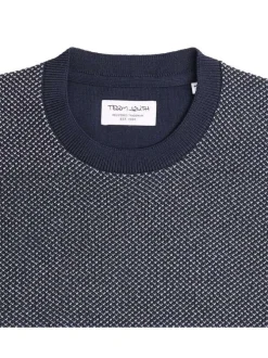 Pull en coton marine uni avec une coupe droite et un col rond