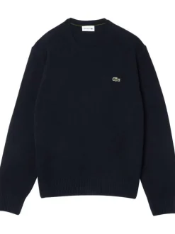Pull en coton marine uni avec une coupe droite un col rond et à logo brodé
