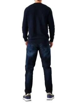 Pull en coton marine uni avec une coupe droite un col rond et un logo cousu
