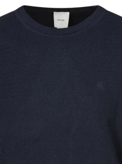 Pull en coton marine uni coupe ajustée col rond maille effet gaufré