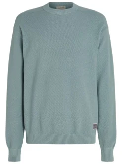 Pull en coton mélangé bleu uni avec une coupe droite et un col rond