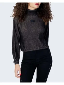Pull en coton mélangé sapin uni avec une coupe évasée, un col roulé et à manches longues