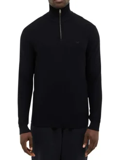 Pull en coton noir avec un col camionneur à zip et des manches longues