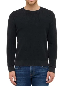 Pull en coton noir avec un col rond et des manches longues