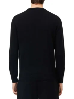 Pull en coton noir en maille piquée à coupe ajustée avec col rond et logo cousu