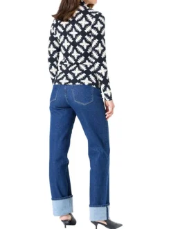 Pull en coton noir et écru à motif fantaisie avec un col montant