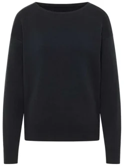 Pull en coton noir uni avec un col rond et des manches longues