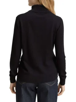 Pull en coton noir uni avec un col roulé et des manches longues