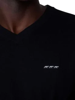 Pull en coton noir uni avec une coupe droite à col v et logo iconique