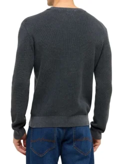 Pull en coton noir uni avec une coupe droite et un col rond