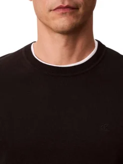 Pull en coton noir uni à col rond avec le mini logo brodé à la poitrine