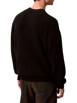 Pull en coton noir uni coupe ajustée col rond en maille gaufrée