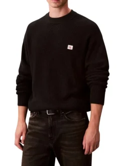 Pull en coton noir uni coupe ajustée col rond en maille gaufrée