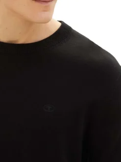 Pull en coton noir uni coupe droite avec un col rond et logo bordé poitrine