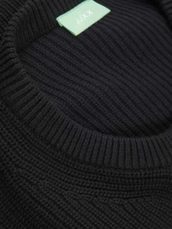 Pull en coton noir uni en maille tricotée à coupe droite et col rond