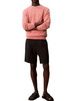 Pull en coton rose uni à col rond avec le mini logo brodé à la poitrine