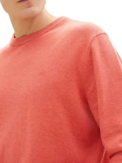 Pull en coton rose uni coupe droite avec un col rond et tissu doux