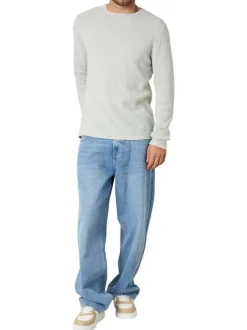 Pull en coton tilleul uni pourvu d'une coupe droite et d'un col rond