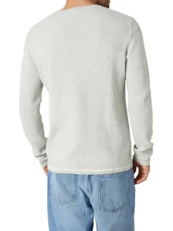 Pull en coton tilleul uni pourvu d'une coupe droite et d'un col rond